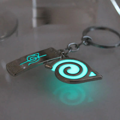 Porte-clés Naruto avec les symboles de Konoha et anti Konoha lumineux